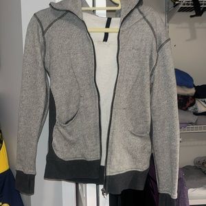 Lululemon grey zip up sweatshirt, size 4 fits a 2.